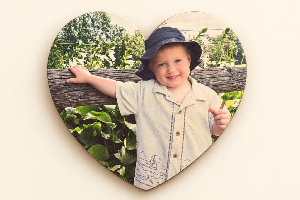 Personalized heart-shaped photo plaque on a warm ivory background